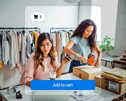 Ecommerce brand team packing Shopify orders in a boutique studio